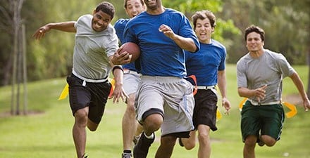 Men playing flag football