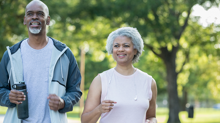 A couple enjoying a vigorous walk.