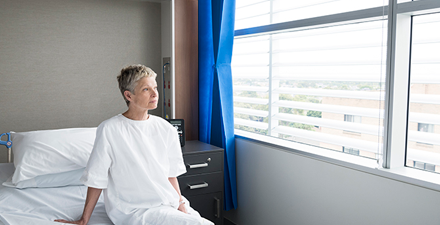 A person in a hospital bed.
