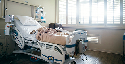 Hospital room with bed.